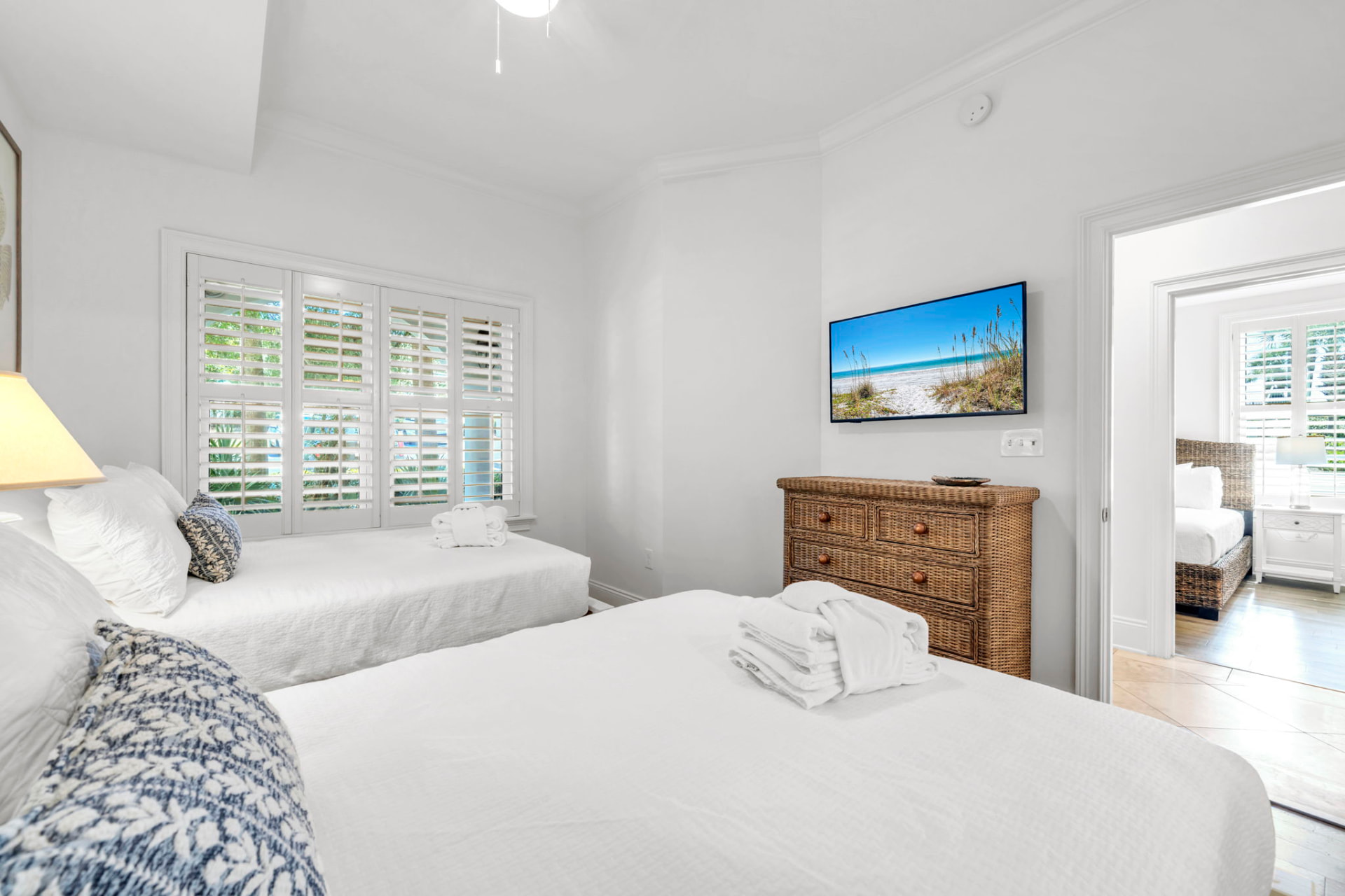 Two full beds with TV at Palmera at Adagio 30A