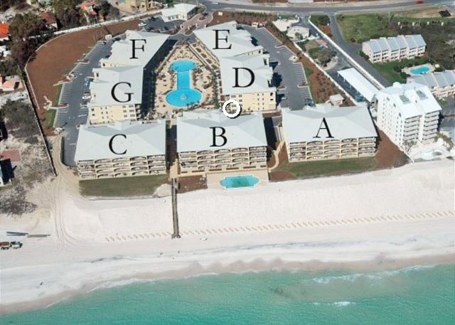 Annotated Adagio aerial map with a white circle marking Palmera's location between buildings D and B at Adagio 30A